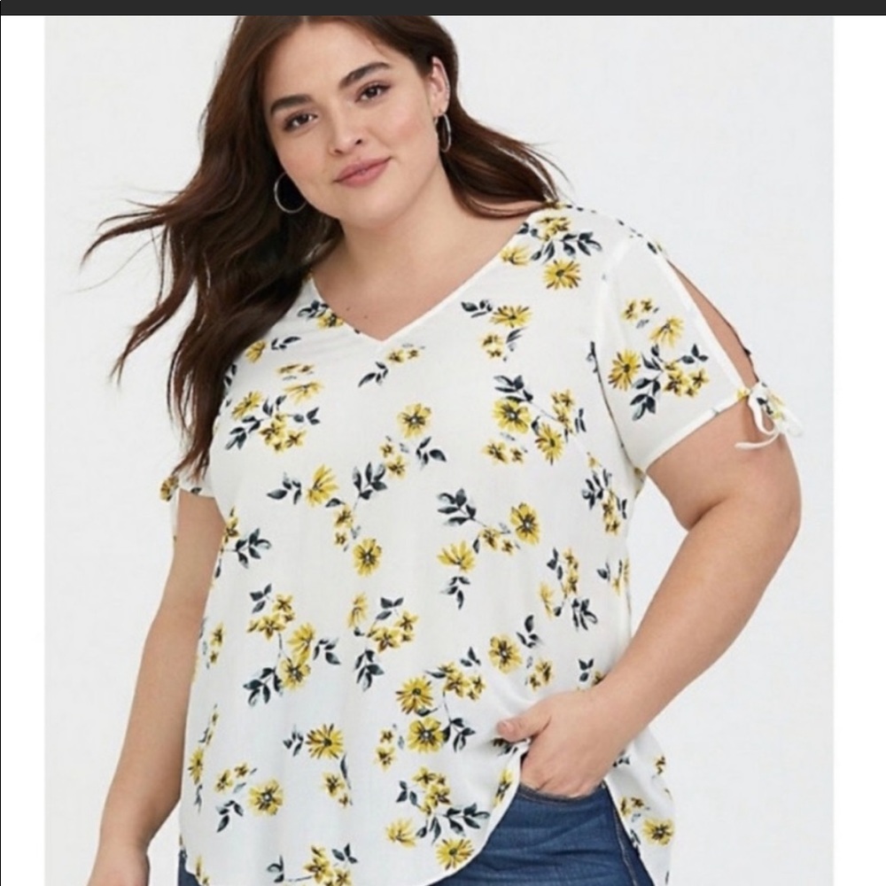Torrid Floral top with cute peek a boo sleeves
